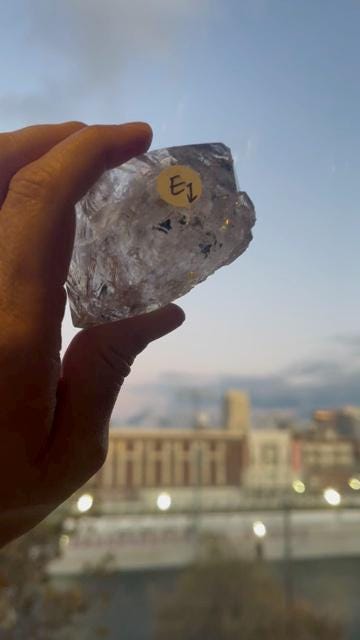 Double Terminated Tibetan Enhydro Quartz Point: Moving Carbon & Rainbow Inclusions