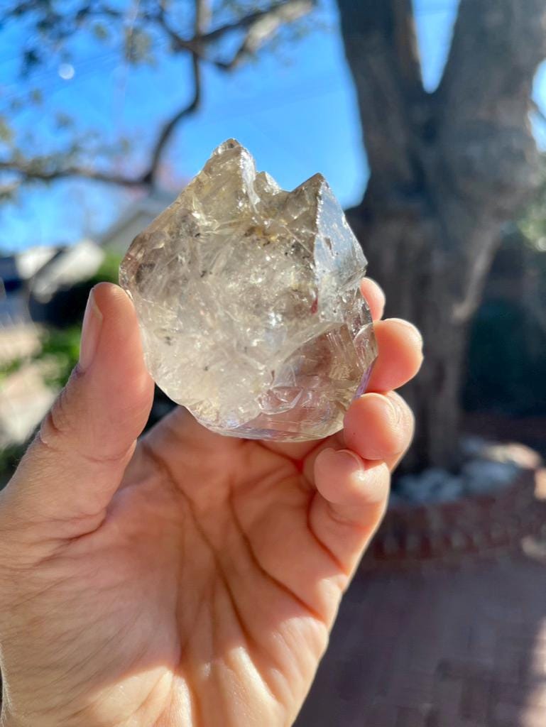 Double Terminated Tibetan Enhydro Quartz Point: Moving Inclusions, Ancient Water Crystal