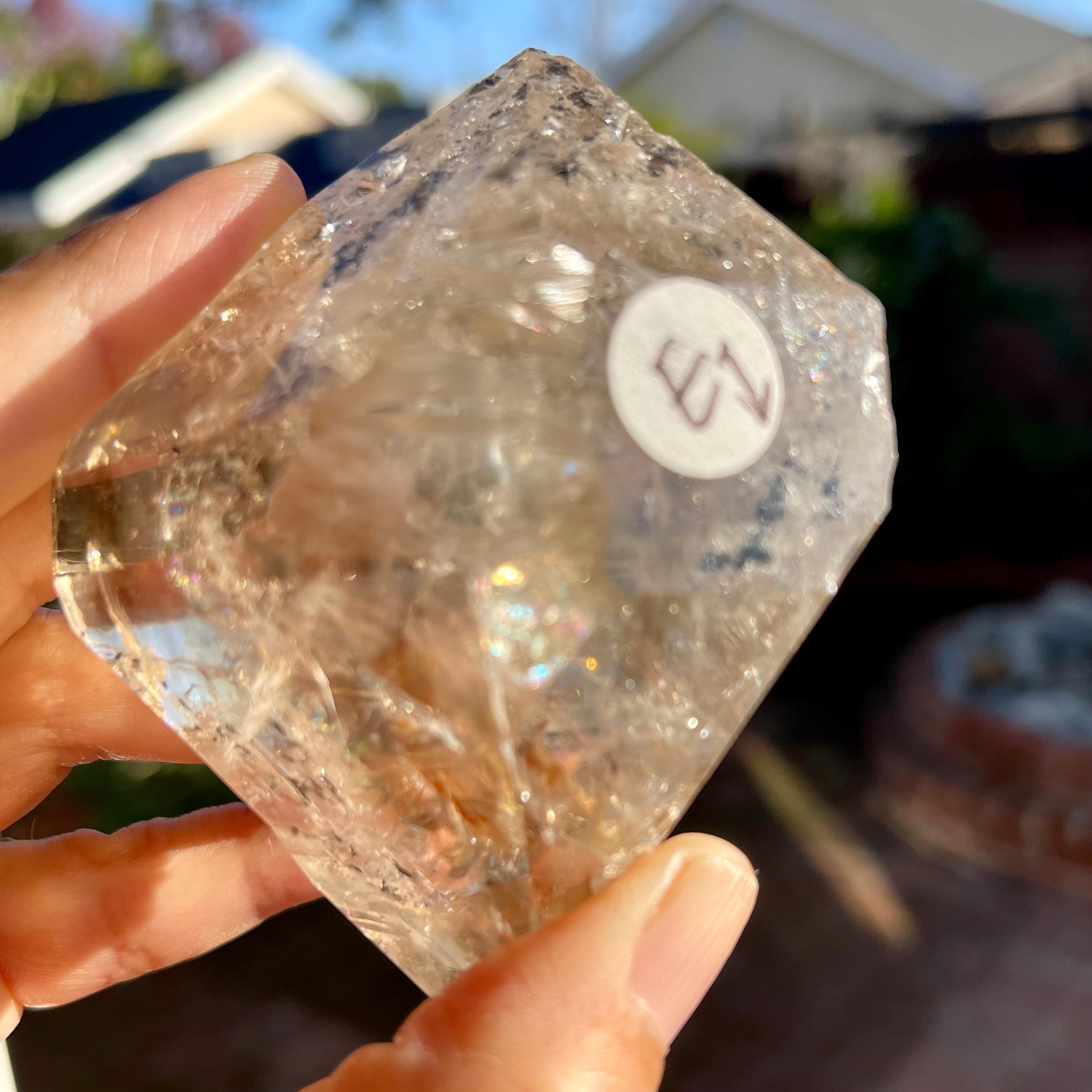 Double Terminated Tibetan Enhydro Quartz Point: Moving Carbon & Rainbow Inclusions