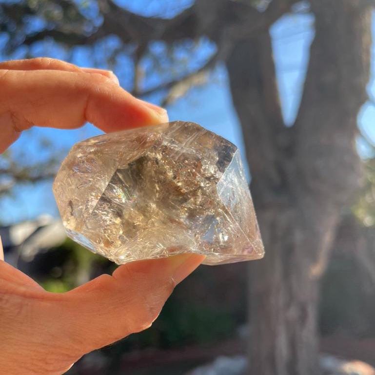 Tibetan Enhydro Quartz Crystal: Ancient Water, Moving Bubble, Rainbow Inclusions